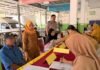 Bhabinkamtibmas Polsek Pasangkayu Monitoring Cek Kesehatan Gratis, Sambut HUT Sulbar ke-22