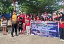 Bhabinkamtibmas Polsek Bambalamotu Kawal Jalan Santai KKN, Wujudkan Kegiatan Aman dan Kondusif