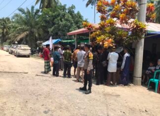 Hadirkan Pelayanan Humanis, Bhabinkamtibmas Polsek Pasangkayu Kawal Pemakaman Warga hingga Berjalan Lancar